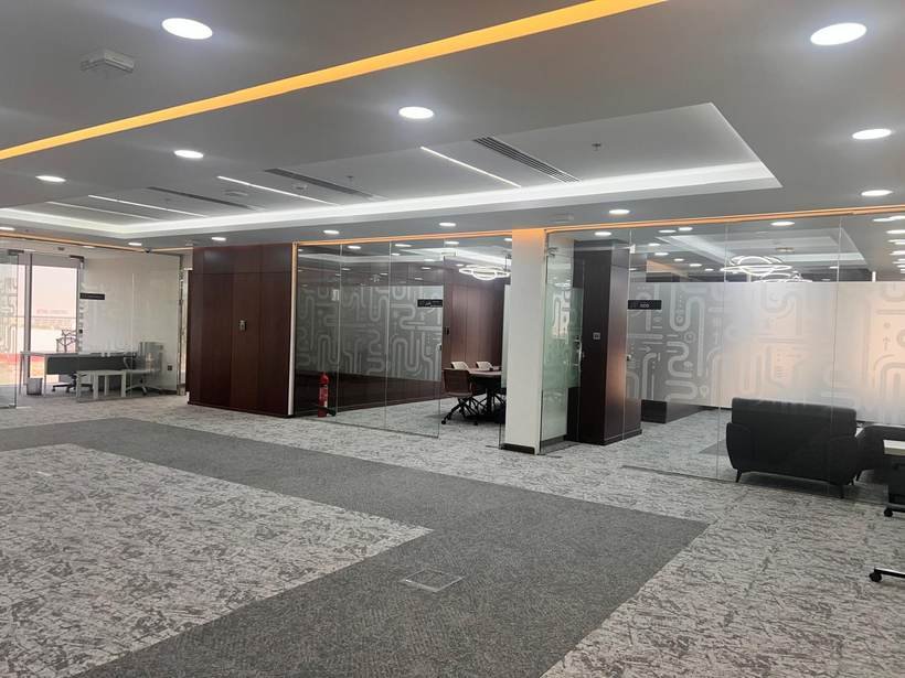 Nxsville office glass partitions with branded frosted graphics